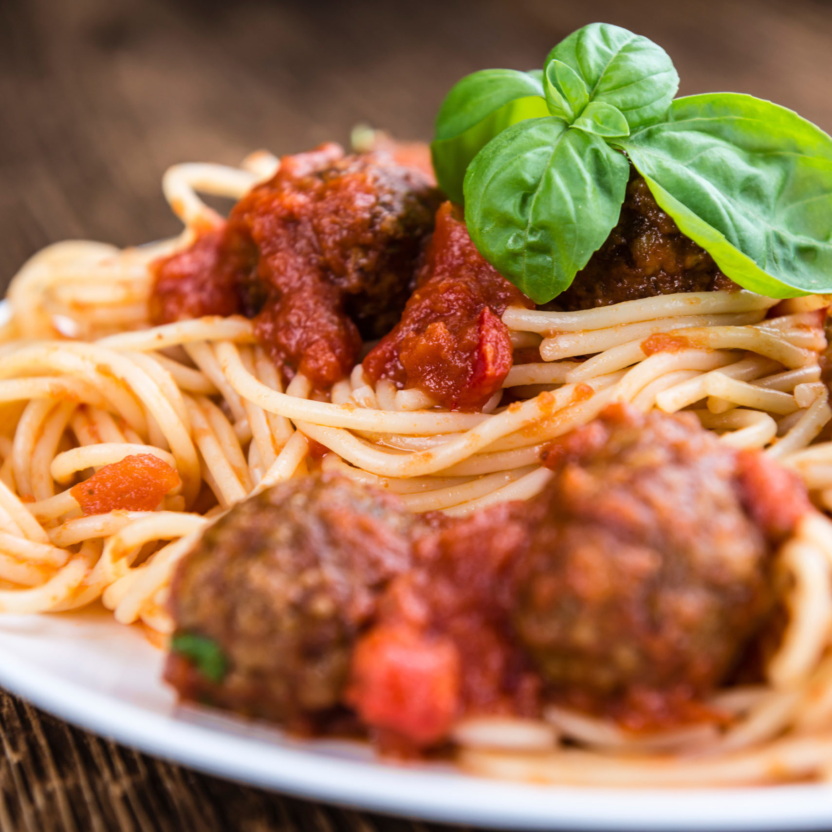 Spaghetti with Meatballs (and Tomato Sauce) as close-up shot (selective focus)